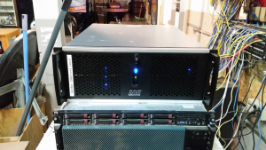 An elegant 4U rackmount computer sitting on top of a short rack