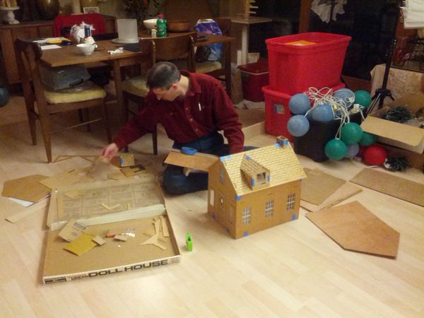 David arranges walls in the original kit from the late 1970s. The box shows two kits however, so an addition was made from scratch using the box drawing.